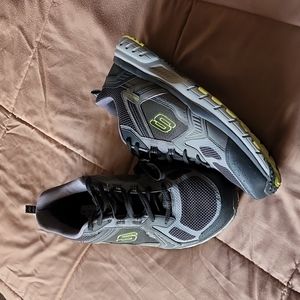 Men's size 13 gray and black Skechers All Terrain shoes.